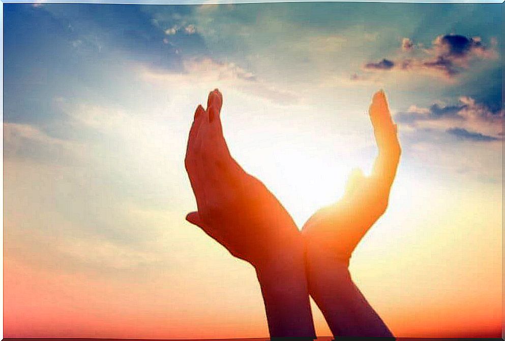 Hands hold the sun