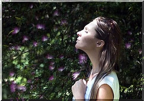 Woman who takes a moment to calm down and breathe properly