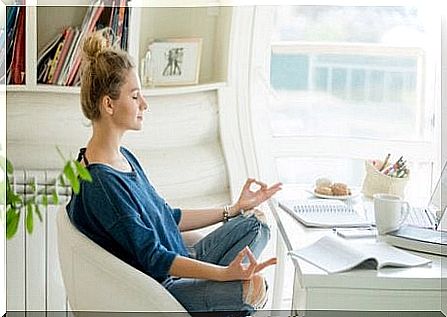 Woman practices simple meditation exercises with closed eyes