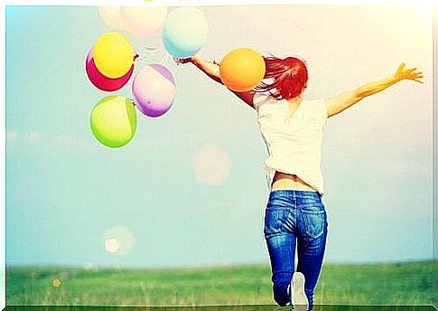 happy girl with balloons