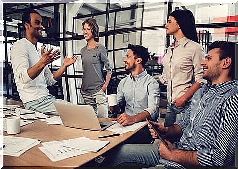 A leader who talks to his team of workers.