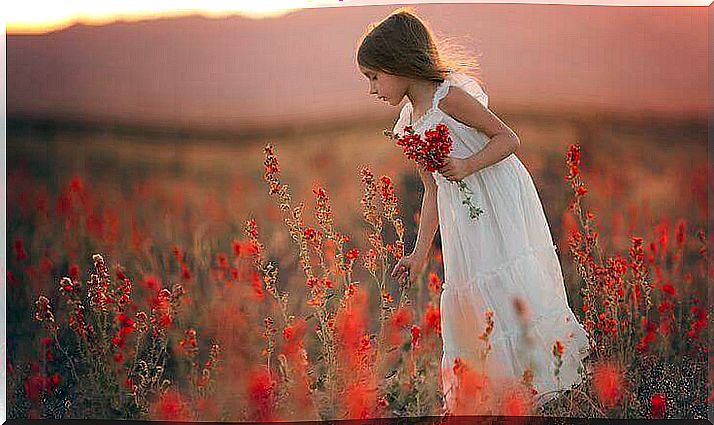 Girl picking flowers